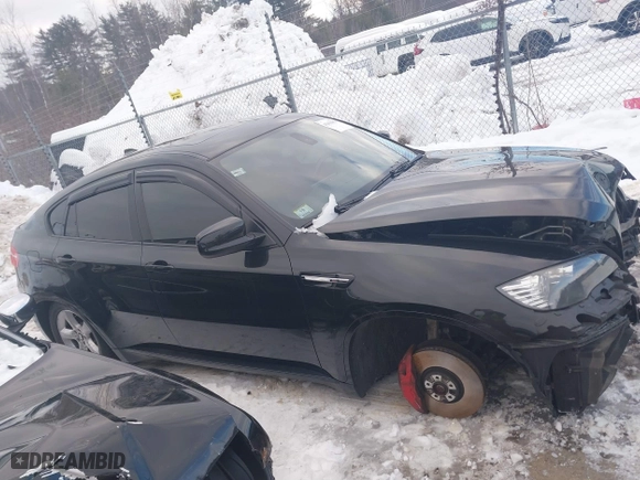 2011 BMW X6 M with VIN 5YMGZ0C57BLK14388, listed as a IAAI auction lot 41411854 with 129,248 mi miles. Bid and sale history available at carsss.com. Image 14.