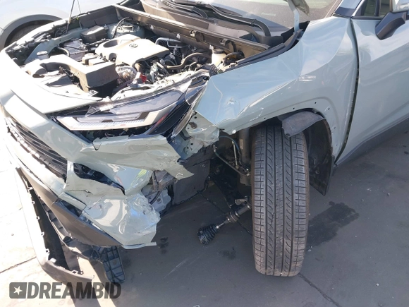 2023 Toyota RAV4 XLE Premium z VIN JTMA1RFV7PJ041609, wystawiony jako IAAI lot #41861931 z przebiegiem 18 862 mil mil oraz . Historia ofert i sprzedaży dostępna na DreamBid. Obrazek 17.
