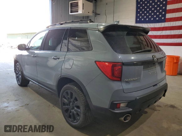 2023 Honda Passport Elite with VIN 5FNYF8H03PB034613, listed as a Copart auction lot 54009215 with 102,841 mi miles and Salvage title. Bid and sale history available at DreamBid. Image 2.