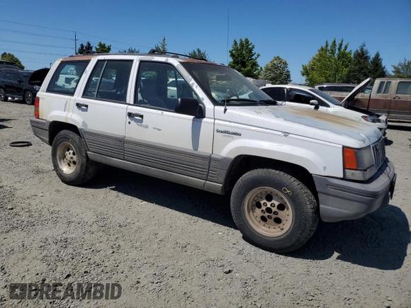 1993 Jeep Grand Cherokee Laredo с VIN 1J4GZ58S2PC654248, выставлен на аукционе Copart как лот 61259735 с пробегом 251 360 миль миль и Списание • Salvage title. История ставок и продаж доступна на DreamBid. Изображение 4.