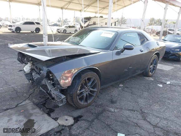 2021 Dodge Challenger GT with VIN 2C3CDZKG4MH677574, listed as a IAAI auction lot 41460036 with 67,170 mi miles. Bid and sale history available at carsss.com. Image 2.