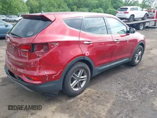 2018 Hyundai Santa Fe 2.4L with VIN 5XYZT3LB3JG541780, listed as a IAAI auction lot 42384065 with 96,754 mi miles and . Bid and sale history available at DreamBid. Image 4.