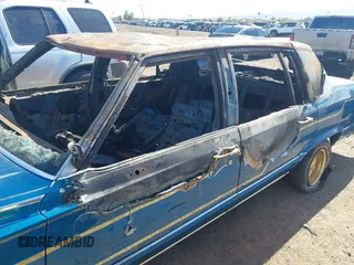 1992 Cadillac Brougham z VIN 1G6DW5472NR710091, wystawiony jako IAAI lot #41657138 z przebiegiem Nie podano mil oraz . Historia ofert i sprzedaży dostępna na DreamBid. Obrazek 6.