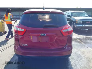2013 Ford C-Max SEL z VIN 1FADP5CU4DL555035, wystawiony jako IAAI lot #42355498 z przebiegiem 172 374 mil mil oraz . Historia ofert i sprzedaży dostępna na DreamBid. Obrazek 16.