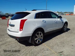 2012 Cadillac SRX Performance Collection with VIN 3GYFNBE33CS614655, listed as a IAAI auction lot 41818918 with 176,899 mi miles. Bid and sale history available at carsss.com. Image 4.