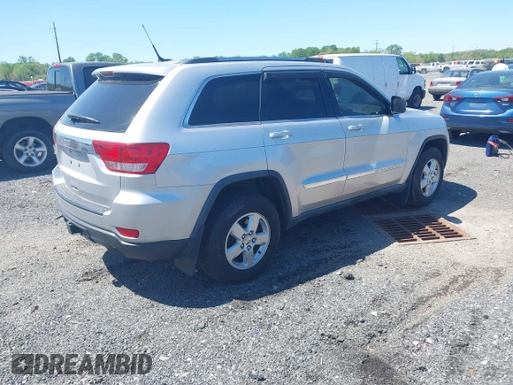 2011 Jeep Grand Cherokee 70th Anniversary with VIN 1J4RR4GG8BC515170, listed as a IAAI auction lot 42135654 with 208,638 mi miles. Bid and sale history available at carsss.com. Image 4.