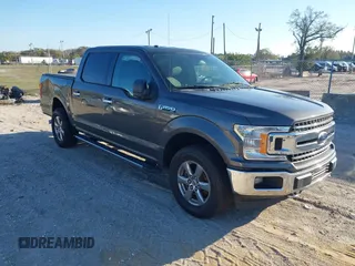 2018 Ford F-150 XL with VIN 1FTEW1EB7JKD00760, listed as a IAAI auction lot 41641141 with 105,449 mi miles. Bid and sale history available at carsss.com. Image 1.