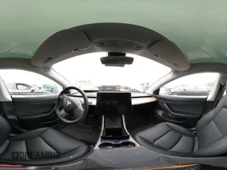 2020 Tesla Model 3 Standard Range Plus with VIN 5YJ3E1EA1LF799766, listed as a IAAI auction lot 41386508 with 90,000 mi miles. Bid and sale history available at carsss.com. Image 23.