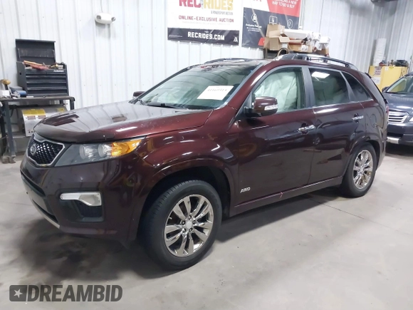 2013 Kia Sorento SX with VIN 5XYKWDA2XDG381984, listed as a IAAI auction lot 41169315 with 144,010 mi miles. Bid and sale history available at carsss.com. Image 18.