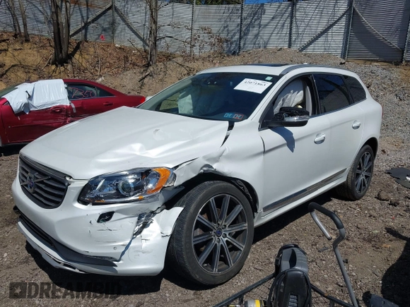 2014 Volvo XC60 R-Design Premier Plus with VIN YV4902DZ8E2545061, listed as a IAAI auction lot 42071863 with 90,718 mi miles and . Bid and sale history available at DreamBid. Image 2.