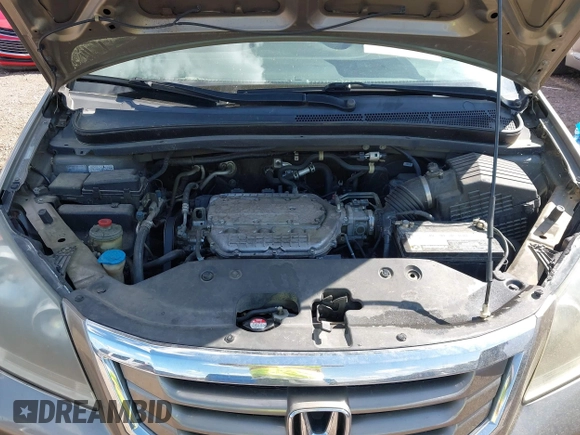 2010 Honda Odyssey LX with VIN 5FNRL3H25AB018051, listed as a IAAI auction lot 41886393 with 256,554 mi miles. Bid and sale history available at carsss.com. Image 10.