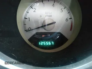 2009 Chrysler Sebring Touring z VIN 1C3LC56B89N517786, wystawiony jako IAAI lot #36918020 z przebiegiem 125 567 mil mil oraz . Historia ofert i sprzedaży dostępna na DreamBid. Obrazek 7.