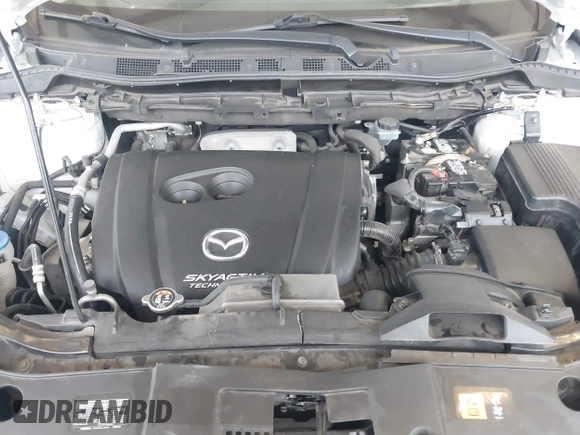 2016 Mazda CX-5 Grand Touring with VIN JM3KE2DYXG0675619, listed as a IAAI auction lot 42137144 with 106,262 mi miles and . Bid and sale history available at DreamBid. Image 10.