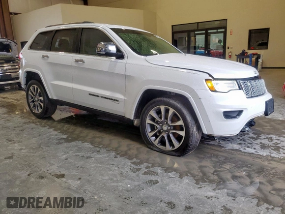 2017 Jeep Grand Cherokee Overland with VIN 1C4RJECG9HC916342, listed as a Copart auction lot 60658285 with 59,470 mi miles and Salvage title. Bid and sale history available at DreamBid. Image 4.