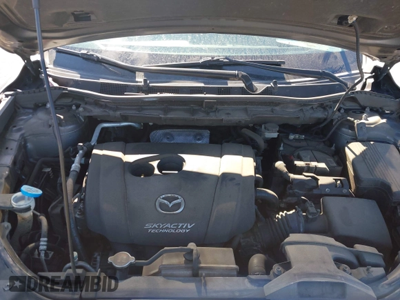 2014 Mazda CX-5 Grand Touring with VIN JM3KE4DY1E0364685, listed as a IAAI auction lot 41665349 with 135,751 mi miles. Bid and sale history available at carsss.com. Image 10.