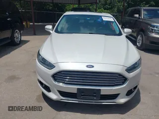 2016 Ford Fusion Titanium with VIN 3FA6P0SU5GR120687, listed as a IAAI auction lot 42571006 with 143,210 mi miles and . Bid and sale history available at DreamBid. Image 6.