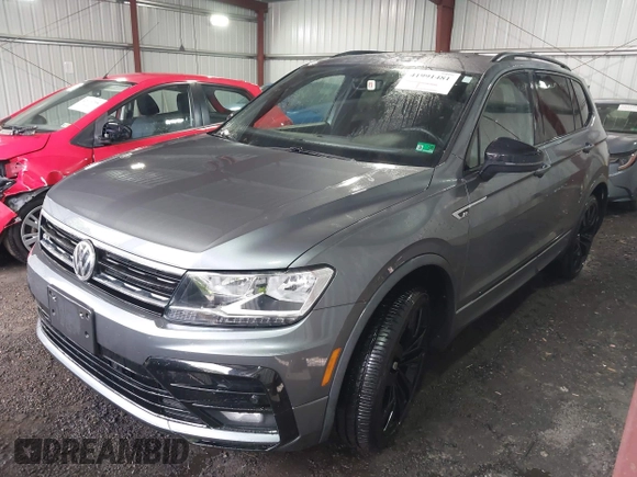 2021 Volkswagen Tiguan SE with VIN 3VV2B7AX0MM039117, listed as a IAAI auction lot 41991481 with 36,824 mi miles and . Bid and sale history available at DreamBid. Image 18.