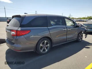 2020 Honda Odyssey Touring with VIN 5FNRL6H84LB032418, listed as a Copart auction lot 59118565 with Not provided miles and Salvage title. Bid and sale history available at DreamBid. Image 3.