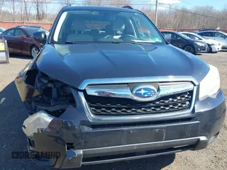 2014 Subaru Forester Premium z VIN JF2SJAECXEH524636, wystawiony jako IAAI lot #41720660 z przebiegiem 174 909 mil mil oraz . Historia ofert i sprzedaży dostępna na DreamBid. Obrazek 18.