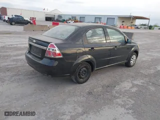 2009 Chevrolet Aveo LT w/1LT with VIN KL1TD56E09B626562, listed as a IAAI auction lot 41876182 with 108,496 mi miles. Bid and sale history available at carsss.com. Image 4.
