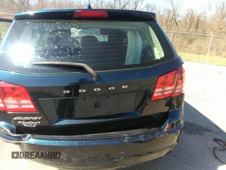 2013 Dodge Journey SE z VIN 3C4PDCAB7DT701180, wystawiony jako IAAI lot #41609700 z przebiegiem 118 207 mil mil oraz . Historia ofert i sprzedaży dostępna na DreamBid. Obrazek 8.