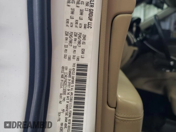 2014 Jeep Grand Cherokee Laredo with VIN 1C4RJFAG2EC132895, listed as a Copart auction lot 49311855 with 147,289 mi miles and Salvage Title. Bid and sale history available at DreamBid. Image 12.