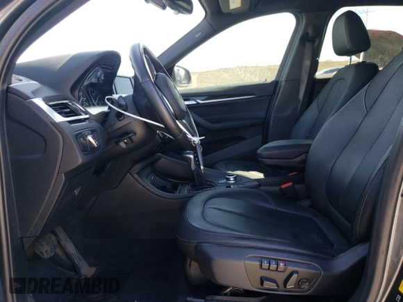 2017 BMW X1 xDrive28i with VIN WBXHT3C35H5F76415, listed as a Copart auction lot 48533495 with 66,448 mi miles and Salvage Title. Bid and sale history available at carsss.com. Image 7.