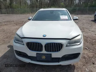 2015 BMW 7 Series 750Li with VIN WBAYE8C54FD780951, listed as a IAAI auction lot 41813038 with 103,131 mi miles. Bid and sale history available at carsss.com. Image 6.