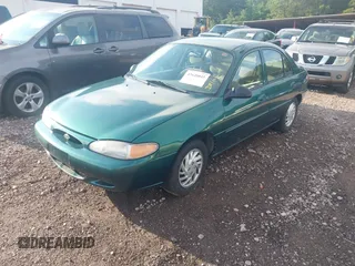 1999 Ford Escort SE with VIN 1FAFP13P2XW264113, listed as a IAAI auction lot 42648045 with 72,253 mi miles and . Bid and sale history available at DreamBid. Image 2.