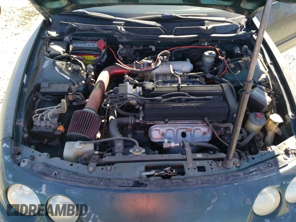 1999 Acura Integra LS with VIN JH4DB7657XS001635, listed as a Copart auction lot 42742925 with 157,447 mi miles and Clean title. Bid and sale history available at DreamBid. Image 11.