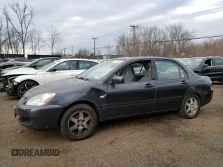 2004 Mitsubishi Lancer LS with VIN JA3AJ36E34U036316, listed as a Copart auction lot 87617655 with 140,855 mi miles and Salvage Title. Bid and sale history available at carsss.com. Image 1.
