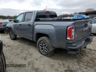 2022 GMC Canyon 4WD AT4 z VIN 1GTG6FENXN1274389, wystawiony jako Copart lot #85255404 z przebiegiem 42 843 mil mil oraz Szkoda całkowita • Salvage title. Historia ofert i sprzedaży dostępna na DreamBid. Obrazek 2.
