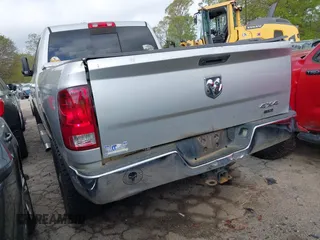 2016 Ram 2500 SLT with VIN 3C6UR5DL9GG210991, listed as a IAAI auction lot 41832164 with 215,098 mi miles. Bid and sale history available at carsss.com. Image 3.