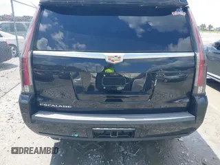 2019 Cadillac Escalade Platinum with VIN 1GYS4DKJ9KR138333, listed as a IAAI auction lot 42523430 with 104,787 mi miles and . Bid and sale history available at DreamBid. Image 16.