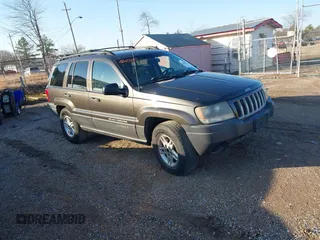2004 Jeep Grand Cherokee with VIN 1J8GX48N54C416754, listed as a IAAI auction lot 41305231 with 244,873 mi miles and . Bid and sale history available at DreamBid. Image 1.
