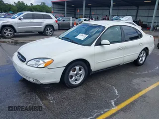2003 Ford Taurus SE Standard with VIN 1FAFP53U13A192387, listed as a IAAI auction lot 42398723 with 247,077 mi miles and . Bid and sale history available at DreamBid. Image 2.