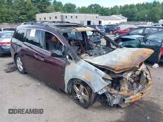 2012 Honda Odyssey Touring with VIN 5FNRL5H95CB040384, listed as a IAAI auction lot 42751342 with 176,222 mi miles and . Bid and sale history available at DreamBid. Image 1.