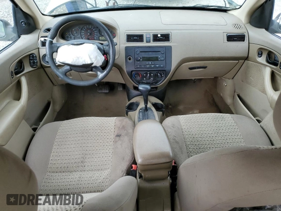 2007 Ford Focus S with VIN 1FAFP34N07W242359, listed as a Copart auction lot 61677025 with 164,445 mi miles and Salvage title. Bid and sale history available at DreamBid. Image 8.