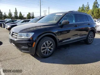 2020 Volkswagen Tiguan SE with VIN 3VV3B7AX2LM105721, listed as a Copart auction lot 79272814 with 59,887 mi miles and Salvage Title. Bid and sale history available at carsss.com. Image 1.