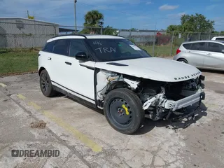 2018 Land Rover Range Rover Velar R-Dynamic SE z VIN SALYL2RV3JA743812, wystawiony jako IAAI lot #40842422 z przebiegiem 35 208 mil mil oraz . Historia ofert i sprzedaży dostępna na DreamBid. Obrazek 1.