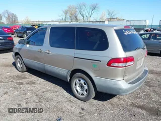 2000 Toyota Sienna CE with VIN 4T3ZF19C1YU240674, listed as a IAAI auction lot 41934876 with 250,196 mi miles. Bid and sale history available at carsss.com. Image 3.