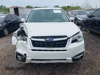 2017 Subaru Forester Touring with VIN JF2SJAWCXHH501702, listed as a IAAI auction lot 42080564 with 188,392 mi miles and . Bid and sale history available at DreamBid. Image 12.