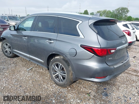 2020 Infiniti QX60 Pure with VIN 5N1DL0MM2LC517417, listed as a IAAI auction lot 42240908 with 52,022 mi miles and . Bid and sale history available at DreamBid. Image 3.