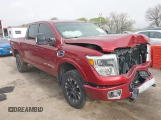 2016 Nissan Titan SL z VIN 1N6BA1F41GN505495, wystawiony jako IAAI lot #42126521 z przebiegiem 102 541 mil mil oraz . Historia ofert i sprzedaży dostępna na DreamBid. Obrazek 1.