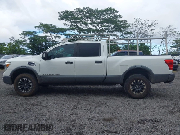 2017 Nissan Titan XD PRO-4X with VIN 1N6BA1F47HN517135, listed as a IAAI auction lot 41605323 with 108,984 mi miles. Bid and sale history available at carsss.com. Image 14.