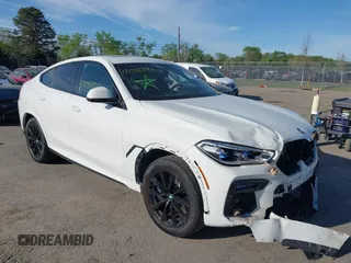 2021 BMW X6 M50i z VIN 5UXCY8C07M9E09762, wystawiony jako IAAI lot #42098734 z przebiegiem 59 898 mil mil oraz . Historia ofert i sprzedaży dostępna na DreamBid. Obrazek 1.