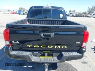 2018 Toyota Tacoma SR with VIN 3TMCZ5AN2JM127244, listed as a IAAI auction lot 41698199 with 61,535 mi miles and . Bid and sale history available at DreamBid. Image 16.