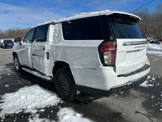 2022 Chevrolet Suburban Premier with VIN 1GNSKFKD0NR189734, listed as a Copart auction lot 46651585 with 25,074 mi miles and Clean Title. Bid and sale history available at carsss.com. Image 2.