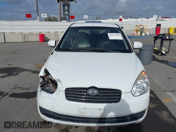 2011 Hyundai Accent GLS with VIN KMHCN4ACXBU619503, listed as a IAAI auction lot 42047496 with 131,135 mi miles. Bid and sale history available at carsss.com. Image 12.