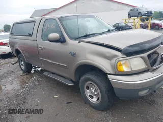 2001 Ford F-150 XL z VIN 1FTRF18W11NA61110, wystawiony jako IAAI lot #42288546 z przebiegiem Nie podano mil oraz . Historia ofert i sprzedaży dostępna na DreamBid. Obrazek 1.